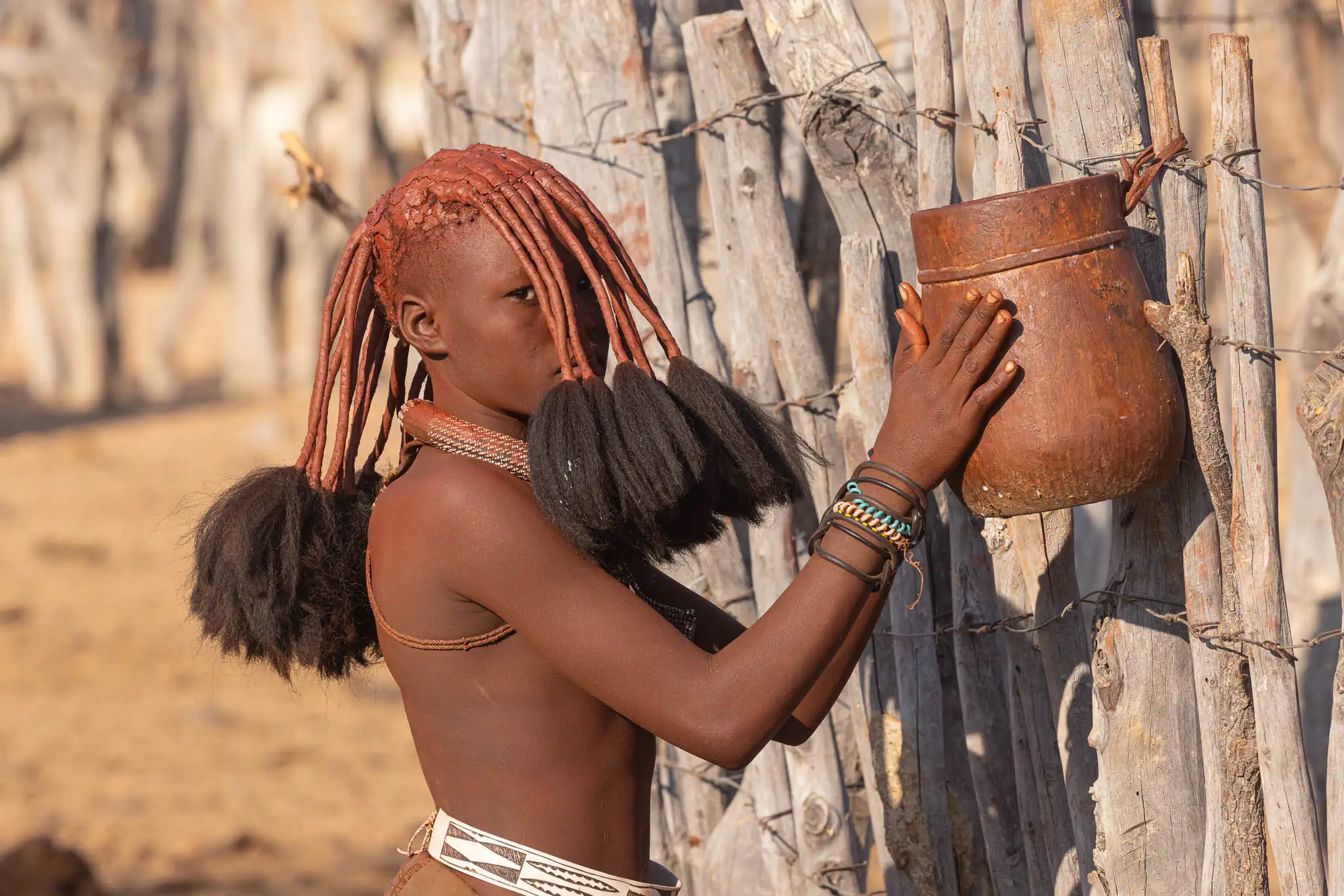 A young Himba girl in Kaokoland in Namibia